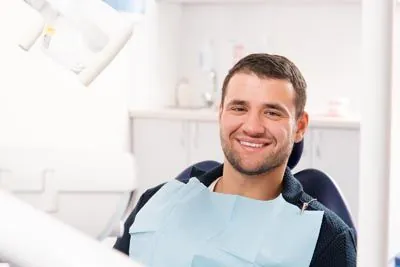 patient smiling during his visit at Cereus Dental Care