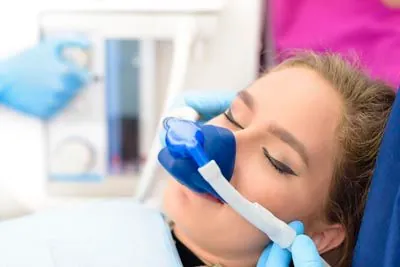 dental patient asleep during her procedure thanks to sedation