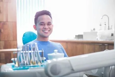 patient smiling during his visit at Cereus Dental Care